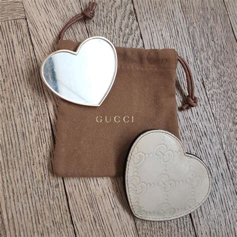 specchio gucci borsa